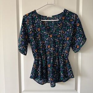 Sienna Sky Navy Floral Peplum Blouse with Green & Orange Accents